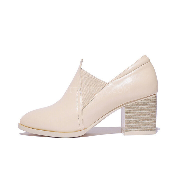 Pointed pure color leather shoes