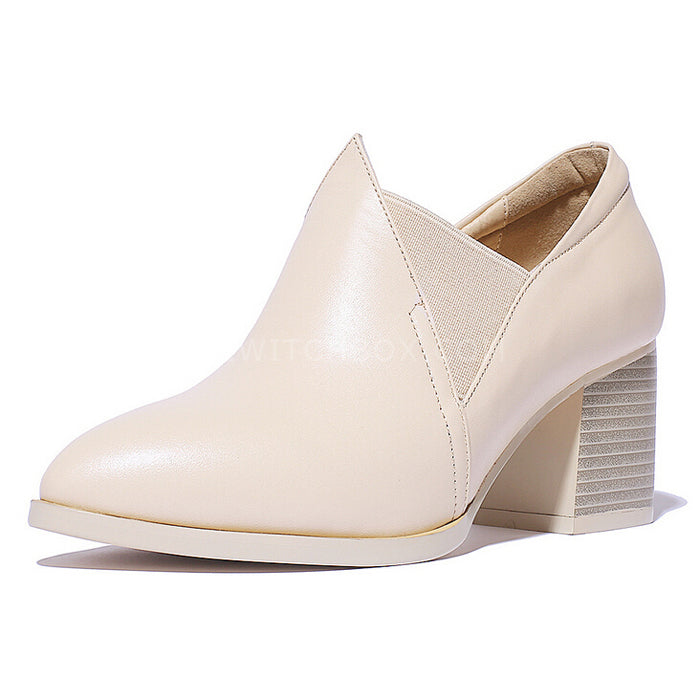 Pointed pure color leather shoes